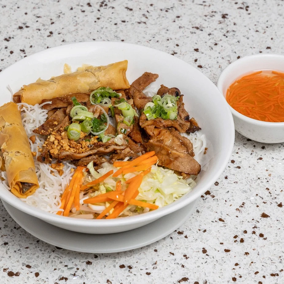 Vietnamese vermicelli bowl with grilled pork and fresh vegetables at Saigon Royal Restaurant in southeast Calgary