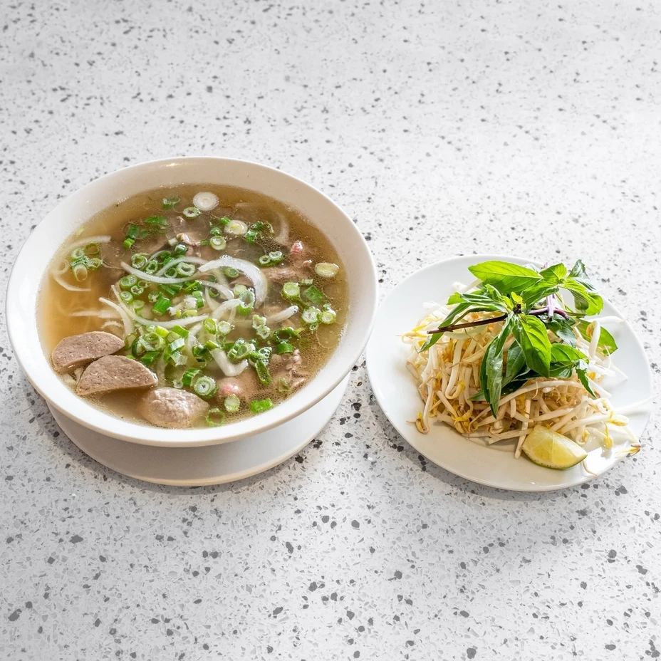 Beef pho with rice noodles and herbs at Saigon Royal Restaurant in Douglasdale Calgary
