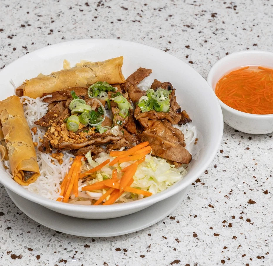 Grilled pork vermicelli bowl with fresh vegetables at Saigon Royal Restaurant Calgary SE